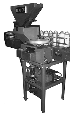 Aerosol Can Manufacturing - Vertical Tube Taper tapes extension tubes to aerosol cans. Beacon Aerosol Can Production